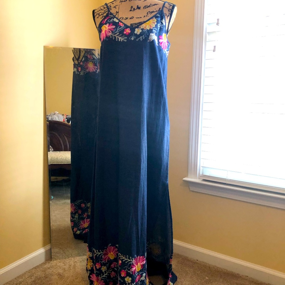 Very cute navy denim maxi dress with adjustable straps.